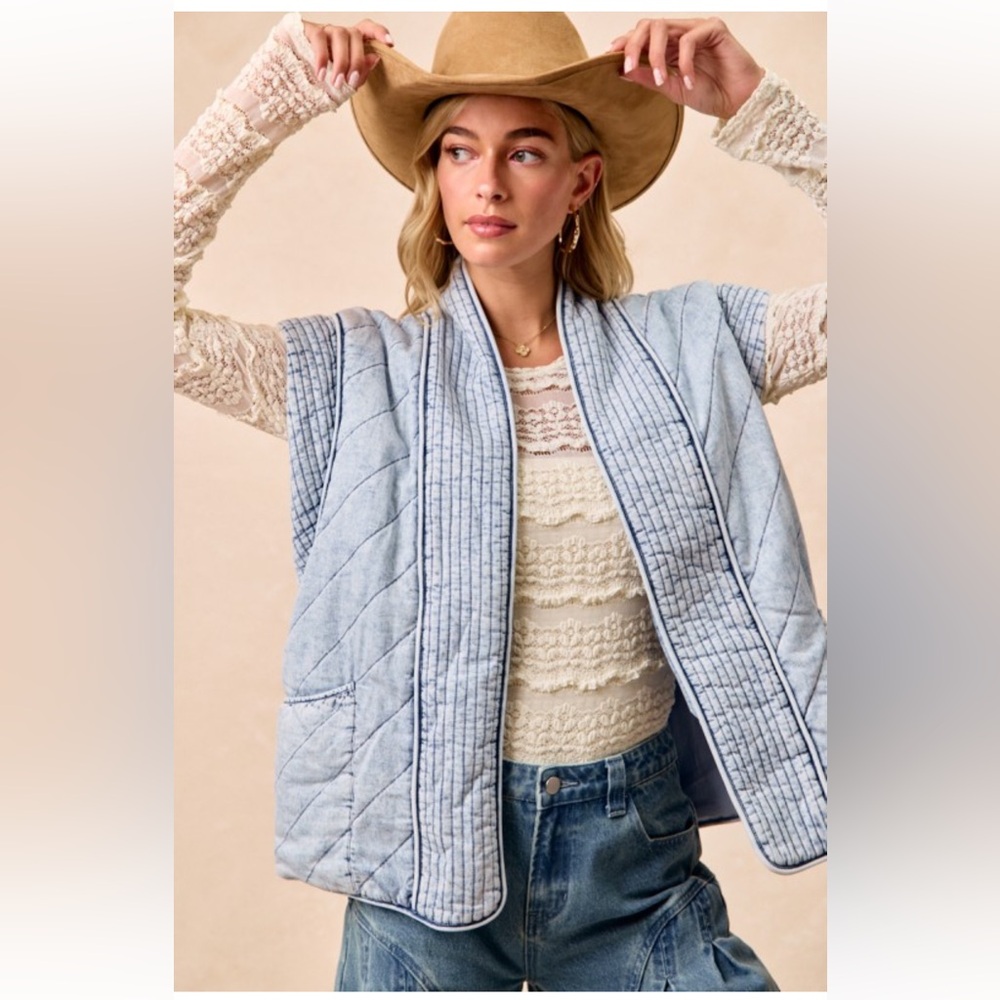311. Quilted washed chambray denim vest in light wash